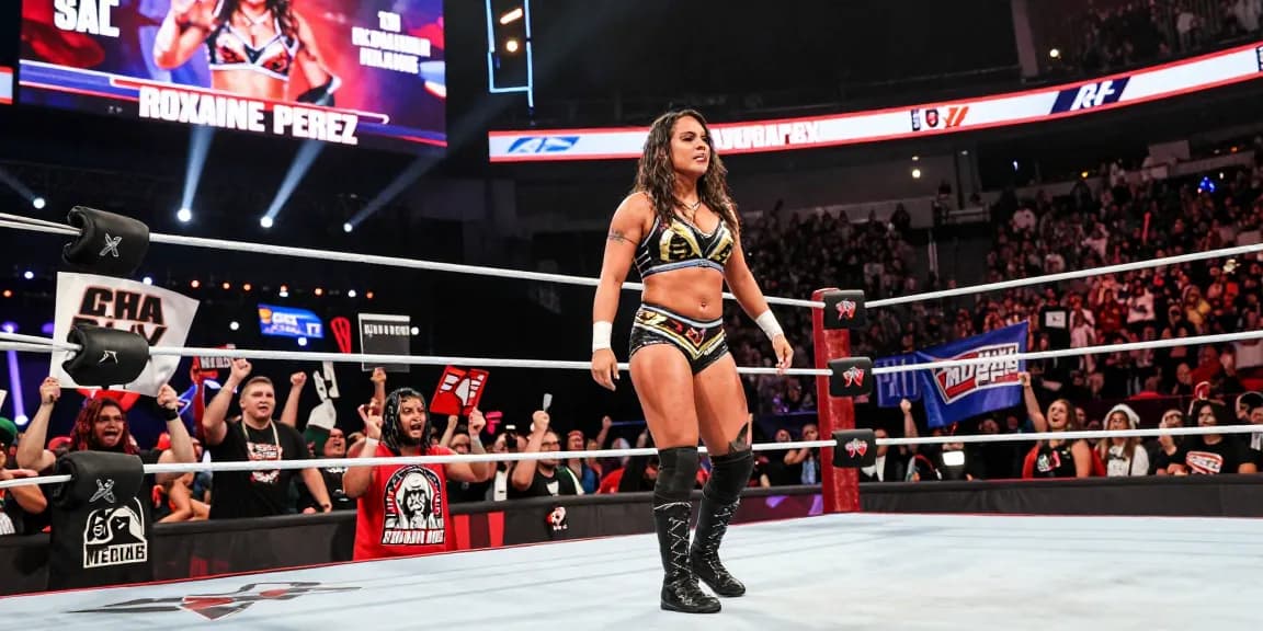 Roxanne Perez making a dynamic entrance in the wrestling ring, captivating fans with her iconic style.