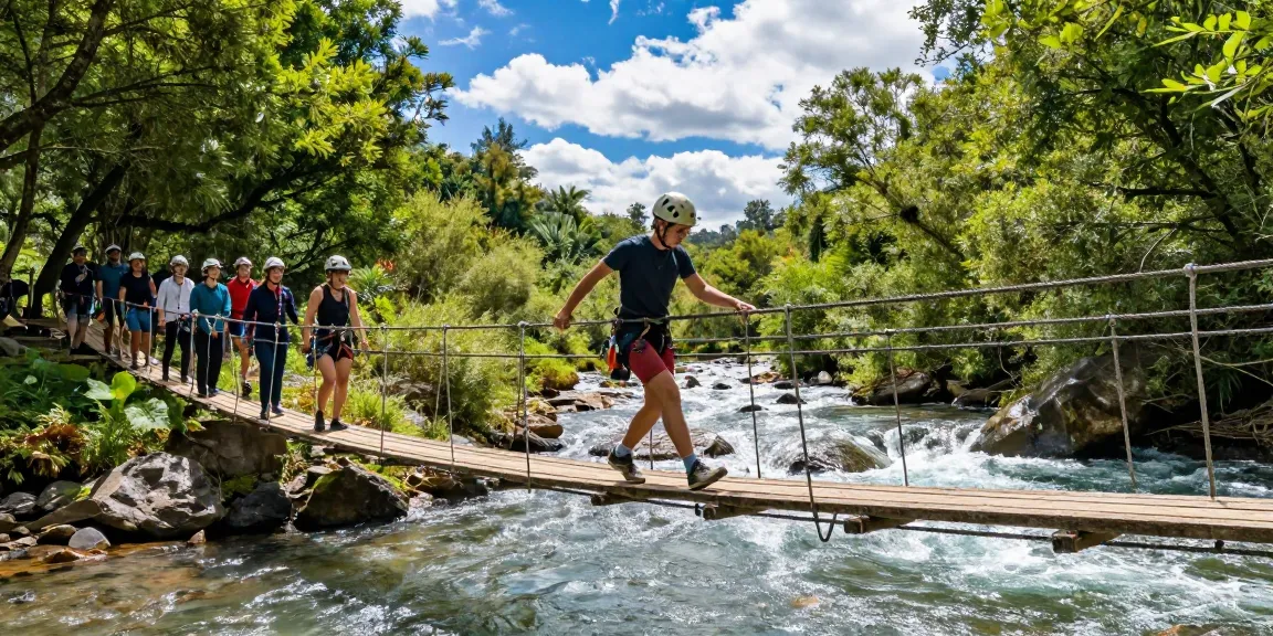 Adventurous crossing on a River Rope Bridge over a sparkling river in a lush outdoor landscape.